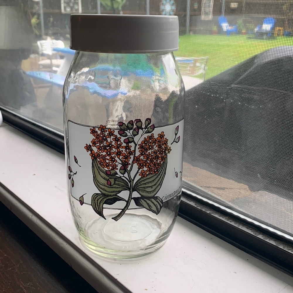 Large vintage glass jar. Cinnamon artwork.